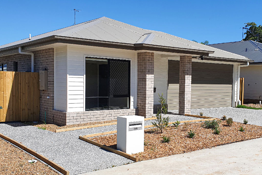 NDIS Facade with Accessible pathways to road, letterbox, rear and entry